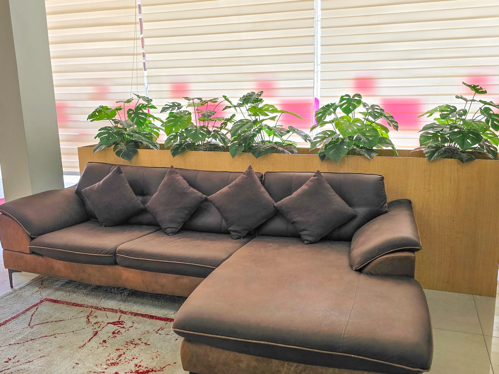 KPTM waiting lounge with sofa and planter