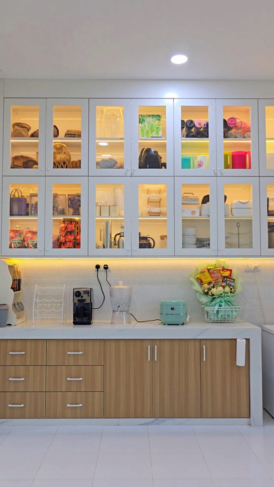 Backlit glass display cabinets over base units