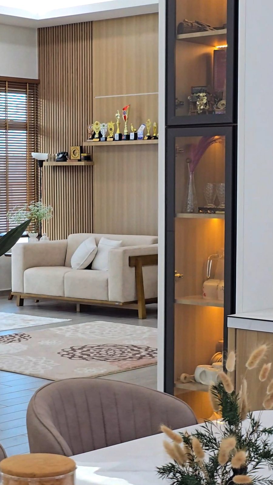 Family lounge with display feature and timber panelling