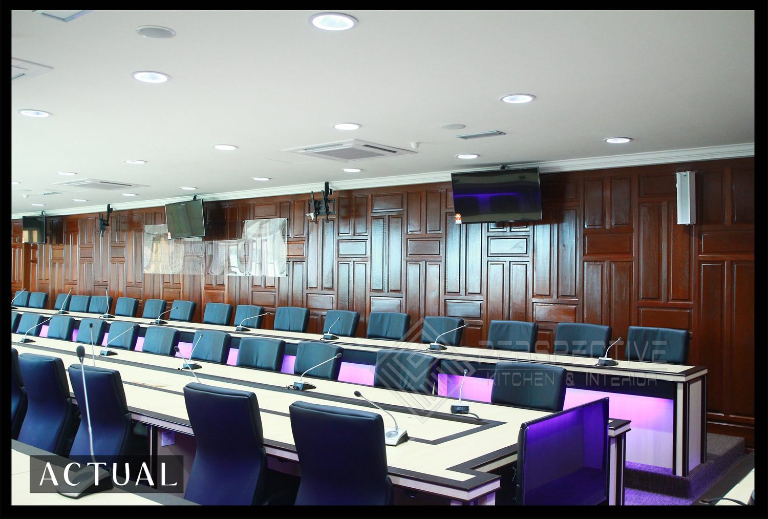 Completed conference room at UMK with timber panelling and accent lighting